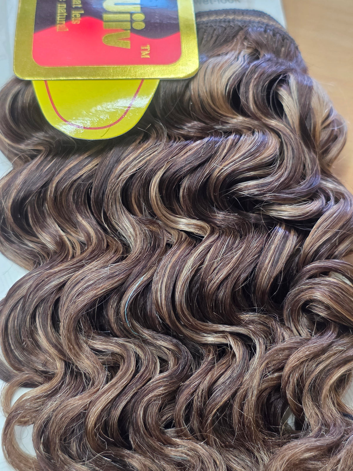 Unique Wiiv Gold Premium Quality Deep Wave Extensions.